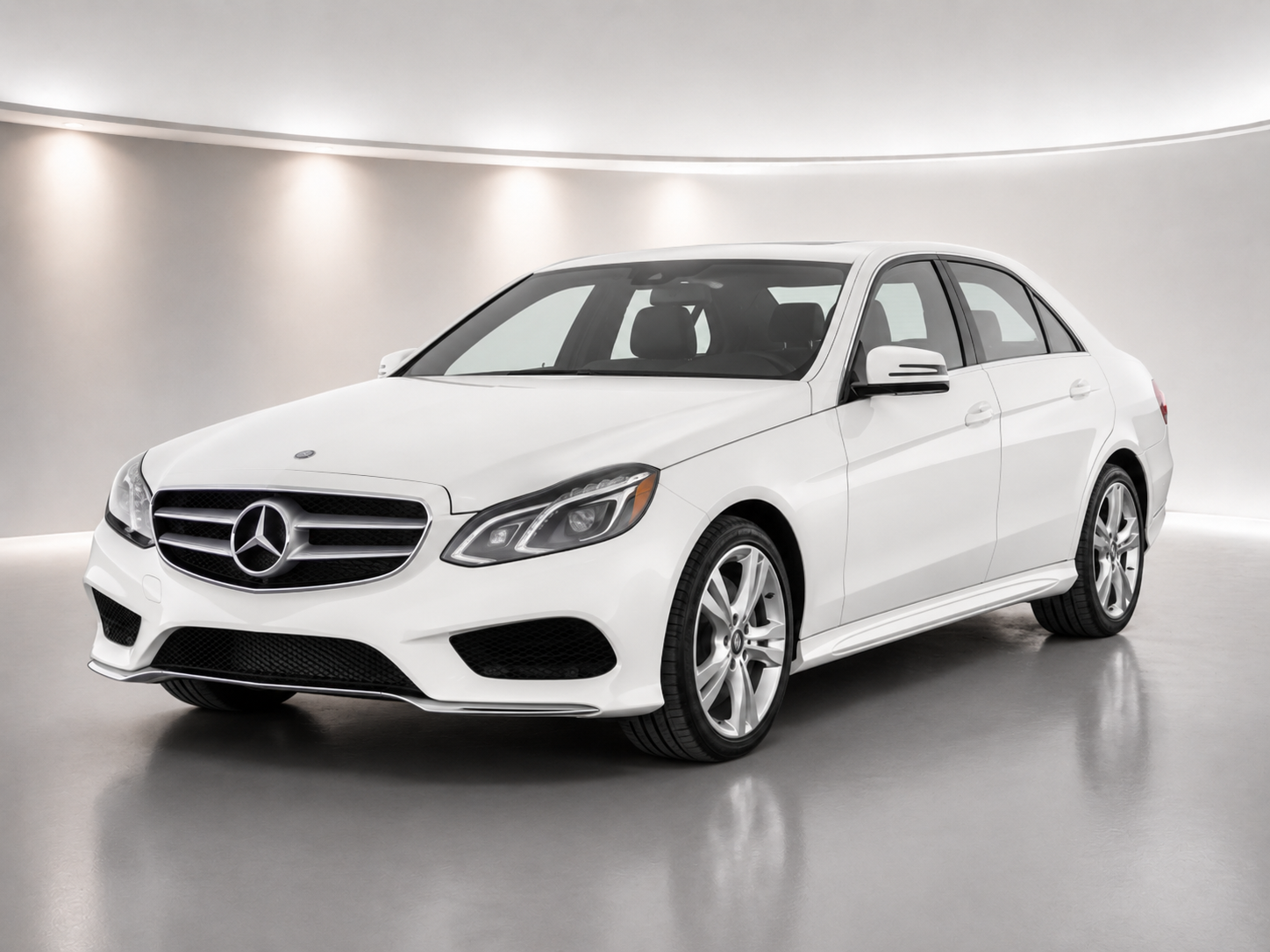 White Mercedes E-Class 2015 luxury sedan
